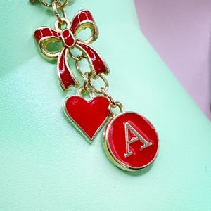 Dije de vaso con inicial personalizada, cadena con lazo y corazón, letra esmaltada personalizada, taza Stanley, regalo elegante para ella (6 colores) Olivia Rodrigo