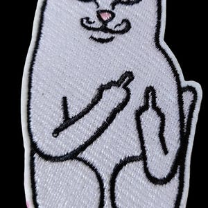 May include: Embroidered white cat patch with black outline and details. The cat is giving the middle finger with both hands. The cat has pink ears and nose, and a black moustache. The patch is on a black background.