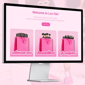 May include: A computer screen displaying a website for Lux Hair, featuring pink shopping bags with the words "closures", "bundles", and "frontals" in pink text.