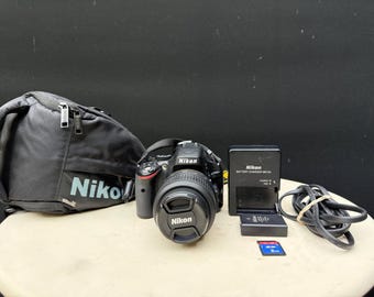 Nikon D5100 16.2MPDSLR Camera Black 18-55mm VR Lens Full Bundle S/C 3,862 READ
