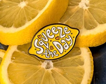 Squeeze The Day - lemon shaped soft enamel pin badge, fundraising for St. Wilfrid’s Hospice