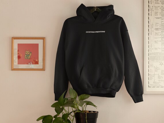 Hoodie with small writing hotsell