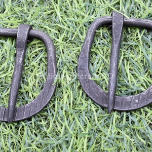 Hand-Forged Iron Belt Buckle .