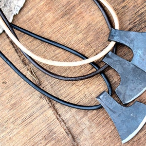 Viking hand Made axe pendent with leather cord.