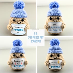 May include: A set of 36 different cards featuring a crocheted potato wearing a blue hat and holding a sign with a funny saying. The cards include sayings like "Keep calm and potato on!" and "It's a potato, don't be a couch potato!"