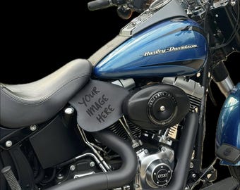 May include: A blue Harley-Davidson motorcycle featuring a black leather side cover with the text YOUR IMAGE HERE printed on it. The motorcycle includes a black seat, matte black exhaust pipes, and a black engine air cleaner cover.