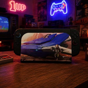 May include: A black handheld gaming console displaying a futuristic vehicle and a figure. The scene is set in a retro gaming room with a vintage TV, neon signs, and a "Game Over" mug. A classic game controller is also visible.