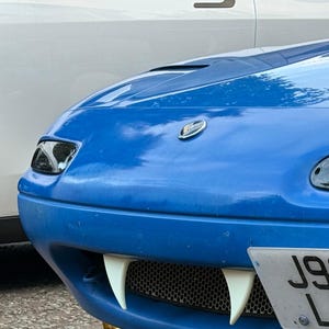 Colmillos universales MX5 Miata Eunos que brillan en la oscuridad