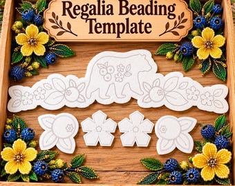 May include: A wooden box containing a Regalia Beading Template sign, white paper cutouts of a bear and floral motifs, and four corner arrangements of yellow beaded flowers with blue beaded berries and green beaded leaves on a wood surface.