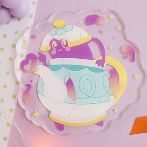 May include: A purple teapot with a yellow lid and a white body. The teapot is decorated with swirls and has a happy face. The teapot is surrounded by a light blue background with stars and swirls.