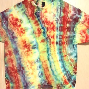 Adult size 2X T-shirt, Gender-neutral, Gildan-brand, Ice-dye/Tie-dye. Multicolored/Rainbow in a striped geode pattern. &quot;Tutti Frutti&quot;.