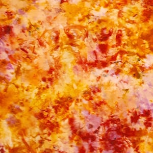 May include: Abstract art print with a vibrant mix of orange, yellow, red, and pink colors. The colors are blended together in a swirling pattern, creating a dynamic and energetic effect.