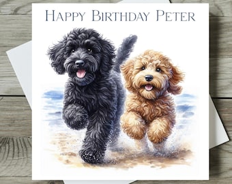 May include: Happy Birthday Peter card featuring a black and a brown doodle dog running on a beach.