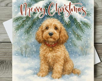 May include: Watercolor Christmas card featuring a golden doodle dog wearing a red collar with a bell, sitting in the snow under a snowy pine tree. The words "Merry Christmas" are written in red script across the top.