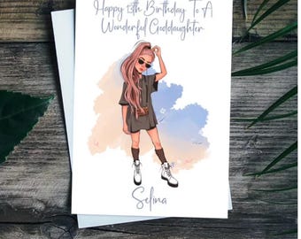 May include: A birthday card with a cartoon illustration of a girl wearing sunglasses and a grey dress. The text on the card reads "Happy 13th Birthday To A Wonderful Goddaughter" and "Selina".