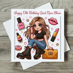 May include: A birthday card with a cartoon illustration of a girl wearing a black crop top, blue jeans, and black boots. The girl is surrounded by pink and gold stars, lips, and makeup items. The card reads "Happy 13th Birthday Great Niece Olivia."