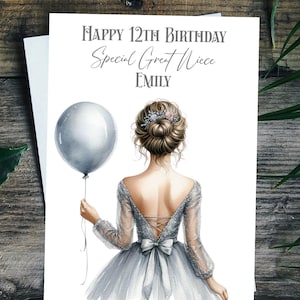 pink dress with black bow Pink Strapless Embellished Gown With Back Bow Detail