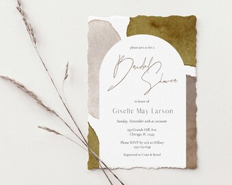 May include: A white invitation with brown and beige watercolor accents. The invitation is for a bridal shower for Giselle May Larson. The invitation includes the date, time, and location of the event. Please RSVP by a certain date to Hillary. The event is registered at Crate & Barrel.
