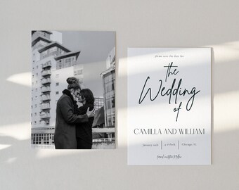 May include: Black and white wedding invitation with the text "The Wedding of Camilla and William" and a photo of a couple embracing in front of a city building.