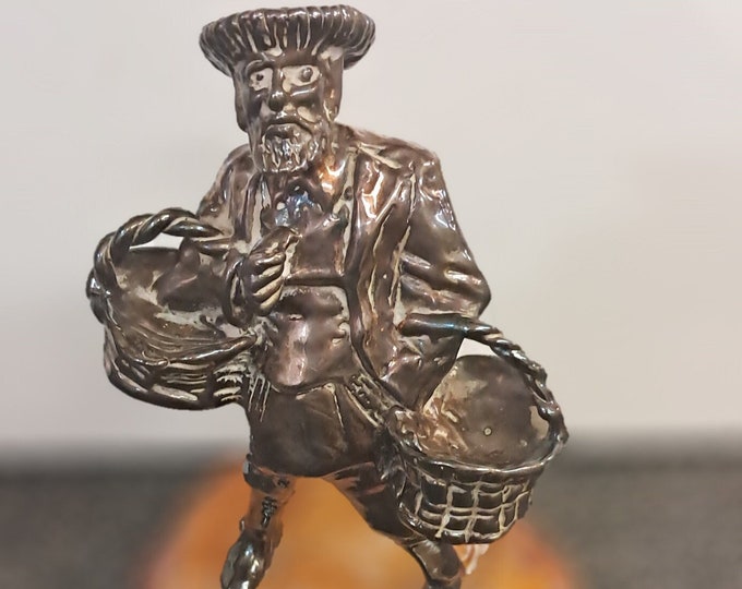 Statue of A  Chassid , Shopping  for  Shabbat  With Baskets