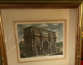 Puede incluir: Una impresión enmarcada de una ilustración antigua del Arco de Constantino en Roma, Italia. La impresión es en blanco y negro con un tono sepia y presenta una representación detallada del arco.