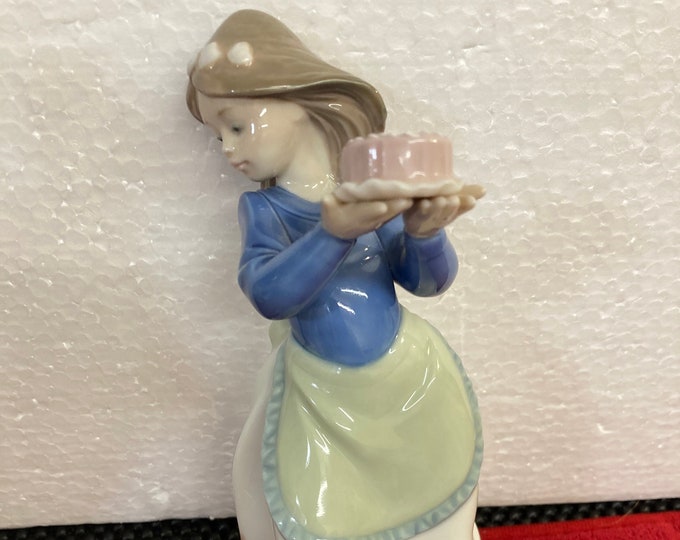 NAO by Lladro  Porcelain Figurine of a Girl and a Dog