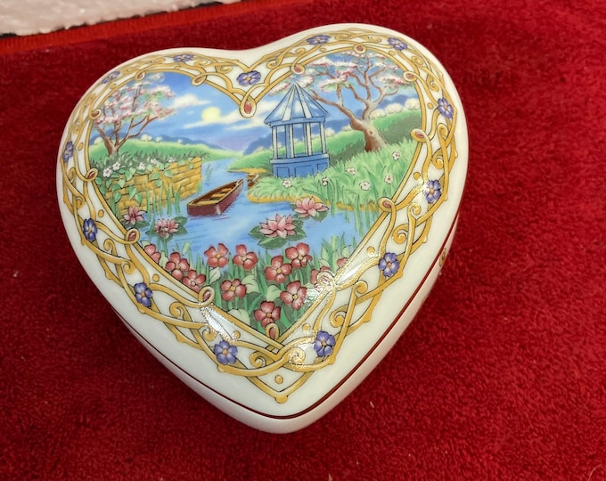 Valentine Serenades is a heart-shaped music box made by Heritage House,