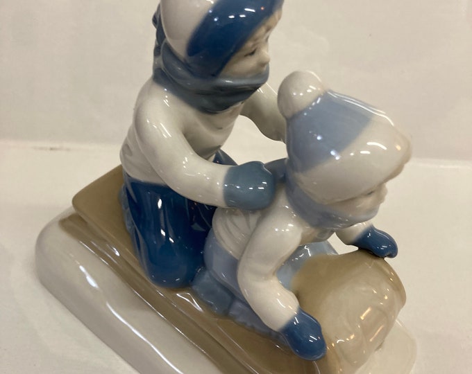 Porcelana De Cuernavaca ,Mexico.Children Sliding