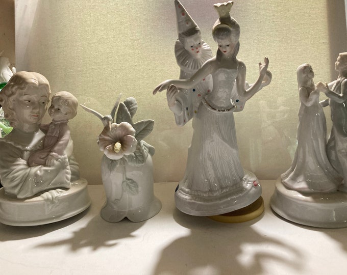 Four Assorted Porcelain  Music Boxes