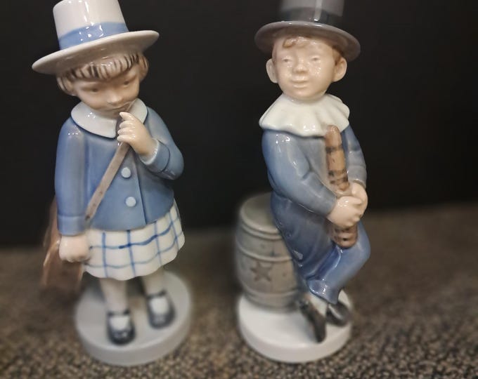 Two Royal Copenhagen  Porcelain Figurines. Boy Juggler & September Girl