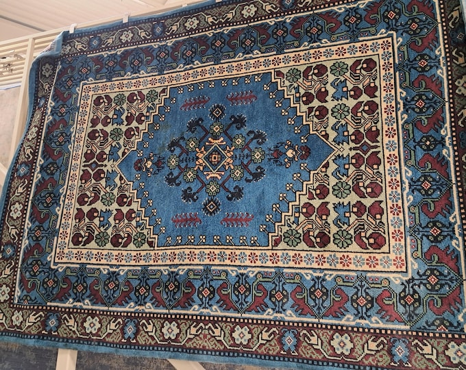 Hand Knotted Kazak Rug: Blue Afghan Wool Carpet (5.58 x 7.58 ft)