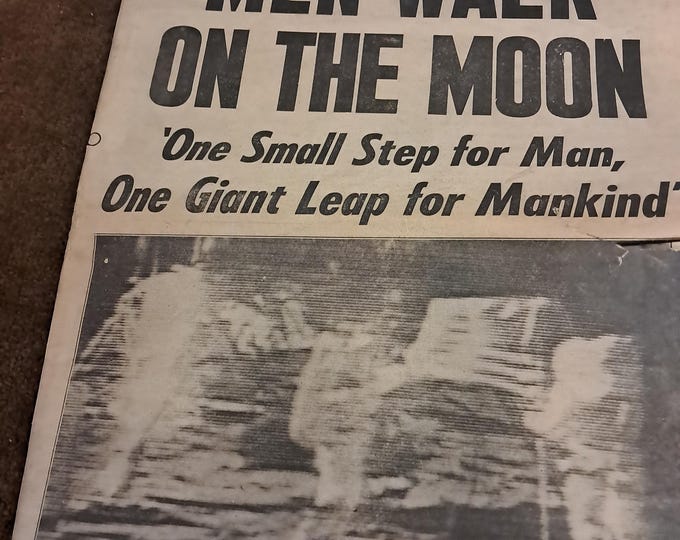 Men walks On The Moon,  2  Newspapers