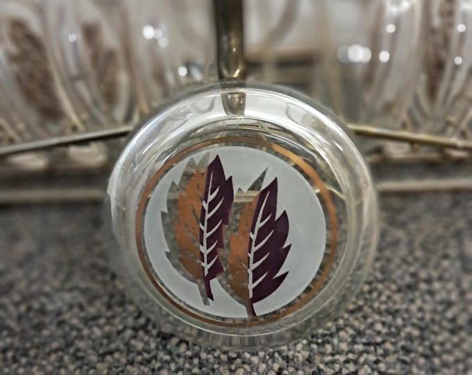 1960's Hollywood  Regency Gold Leaf Coasters In Brass Holder