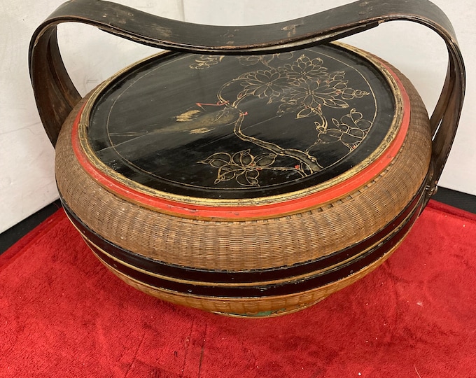 Antique Chinese wedding basket of woven rattan and bamboo.