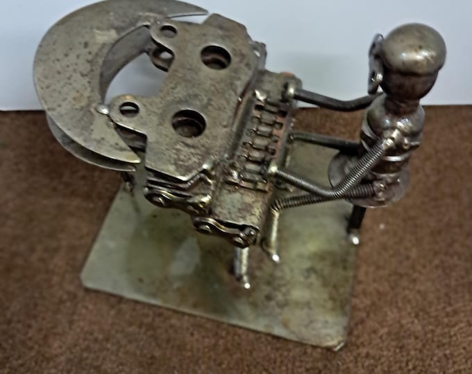 Iron statuette, 'Rustic Piano Man'