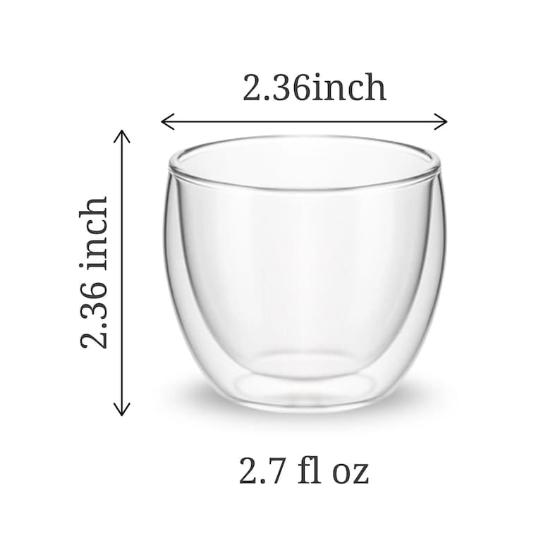 May include: A clear, double-walled glass cup with a rounded base. The cup features a width of 2.36 inches, a height of 2.36 inches, and a capacity of 2.7 fl oz, as indicated by the text and dimension arrows visible in the image.