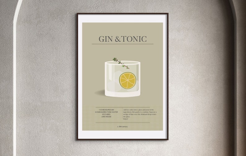 May include: A framed print featuring a Gin & Tonic recipe. The illustration shows a cocktail glass with a lime wedge and sprig of herbs. The text includes the drink's name, ingredients, and instructions, all set against a neutral background.