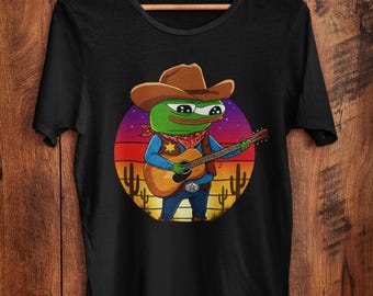 Cowboy Apu Meme Shirt Pepe Frog Playing Guitar Funny Western Parody Design Country Music Meme Shirt Ironic Frogcore Humor Cowboy Style