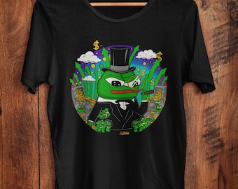 Camiseta con meme de Pepe, el rico ladrón barón, diseño de parodia de dinero de rana Apu, divertida camiseta irónica de meme capitalista, camiseta de dibujos animados de monóculo de cigarro