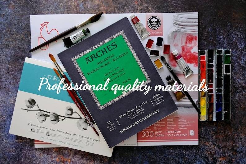 May include: An assortment of watercolor art supplies, including watercolor paper, paint tubes, paint brushes, and a palette of watercolor paints. The text "Professional quality materials" is visible.