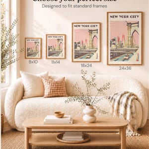 Four framed wall art prints of a New York City bridge scene in sizes 8x10, 11x14, 18x24, and 24x36 inches. The prints feature a pink sky, bridge architecture, and city traffic. Text above reads Choose your perfect size All sizes are frame-ready.