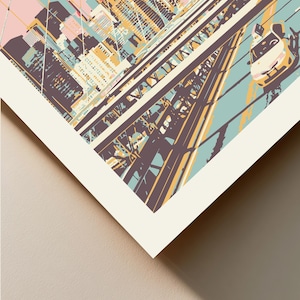 May include: A graphic art print featuring a stylized urban cityscape with a bridge structure, suspension cables, and a yellow taxi cab. The color palette includes shades of pink, teal, dark brown, and yellow, with the text Fine Art Print Detail.