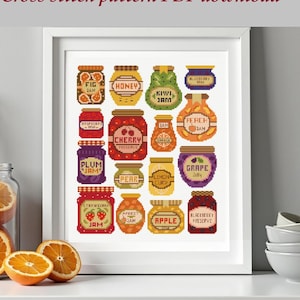 Peut inclure: Motif de point de croix encadré représentant des pots de confiture. Les pots contiennent de la figue, du miel, du kiwi, de la myrtille, de la pêche, de la framboise, de la cerise, de l'orange, de la prune, de la poire, de la crème de citron, de la gelée de raisin, de la fraise, de l'abricot, de la pomme et de la mûre.