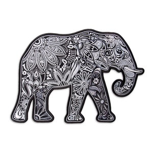 May include: Black and white patterned elephant silhouette. The elephant is decorated with intricate floral designs.