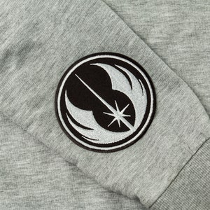 May include: Grey sweatshirt with a black and white embroidered Rebel Alliance symbol on the sleeve.