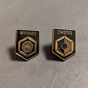 Myriade + Umbra Ingress Anomalie Épingle or schwarz Nemesis