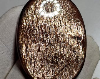 Natuurlijke zonnesteencabochon met regenboogrooster uit Tanzania|| Grootte=47×34×7||gewicht=95 karaat