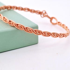 Braided pure copper bracelet, minimalist stacking bangle, unique 7th anniversary gift for her, handmade copper jewellery uk