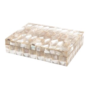 May include: Rectangular decorative box with a mother-of-pearl mosaic design. The box is a light beige color and has a hinged lid. The mosaic pattern is made up of small, irregular shapes. The box is likely used for storing jewelry or small items.
