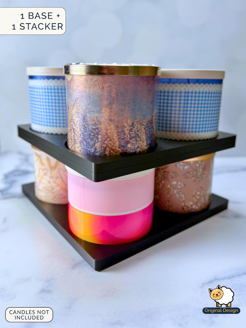 May include: A black triangular candle storage system consisting of one base and one stacker, designed to hold multiple cylindrical candles. The unit features cutouts for candle placement. Text on the image reads 1 BASE + 1 STACKER.